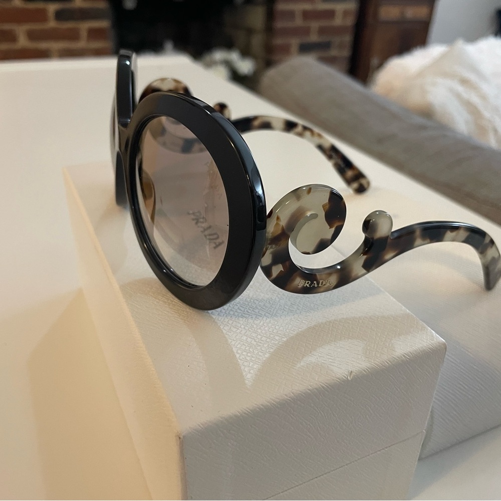 Prada Baroque Marble Sunglasses 
New with original box and cloth .